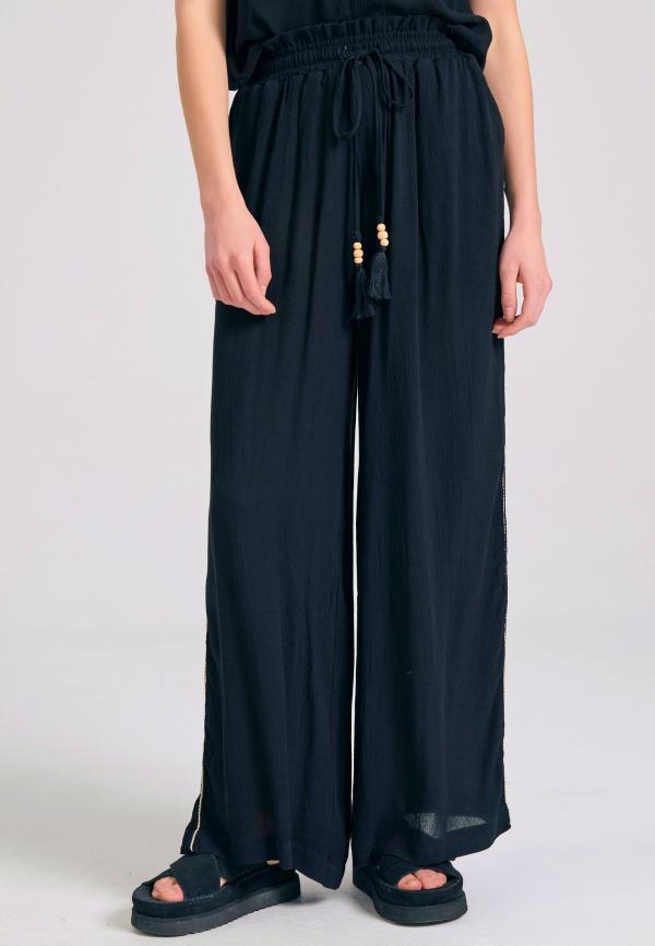 Loose fit παντελόνα από τεχνητό μετάξι