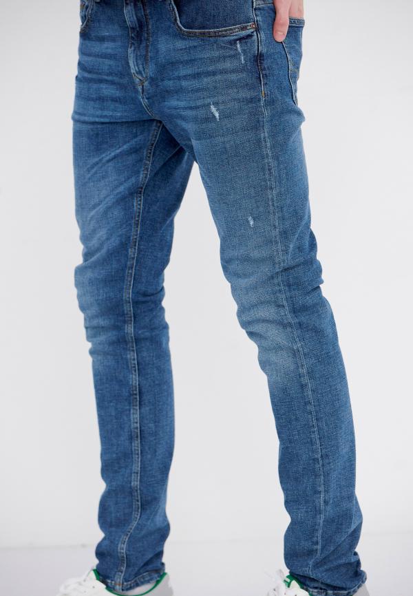 Tapered fit τζιν παντελόνι με ελαφριές φθορές